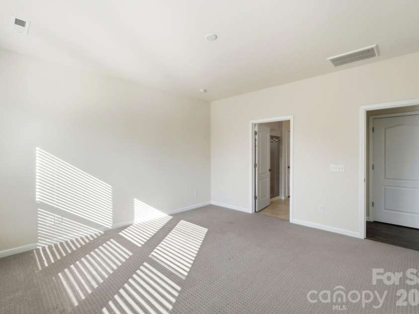 1620 Red Leaf Drive, Fort Mill, SC 29715.  MLS# CAR4402773, YatesRealty ID 40438. Primary bedroom