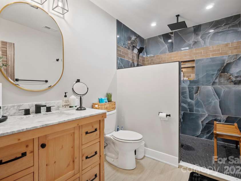 685 Knollcrest Drive, Concord, NC 28025.  MLS# CAR4256189, YatesRealty ID 4045. Main level guest en-suite bath