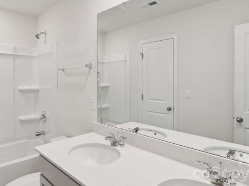 83 Piney Woods Road, Fletcher, NC 28732.  MLS# CAR4409480, YatesRealty ID 40452. Photos are representative