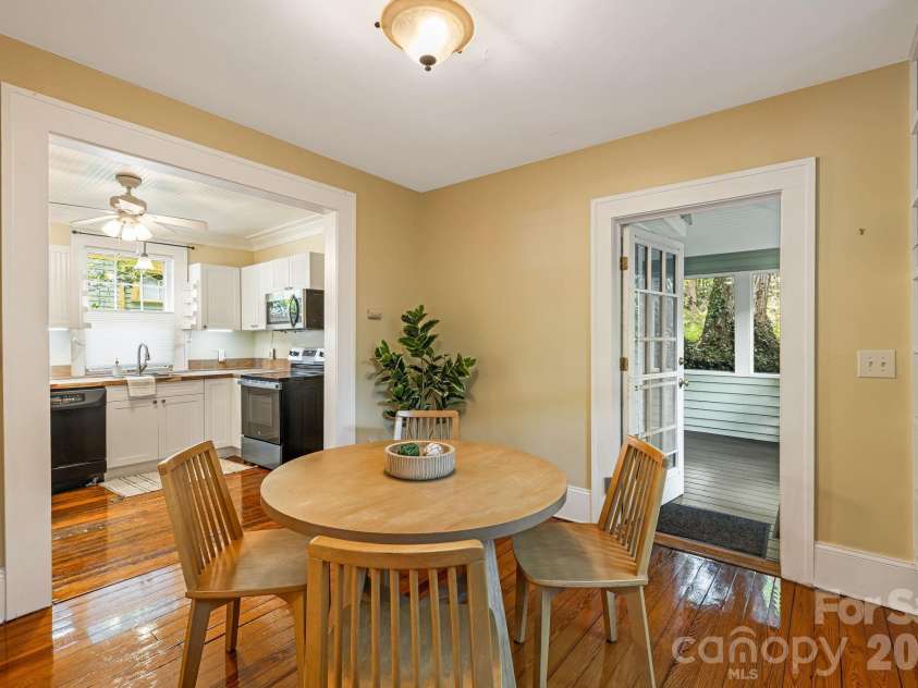 28 Woodlawn Avenue, Asheville, NC 28801.  MLS# CAR4405546, YatesRealty ID 40468. Dining Opens to Kitchen