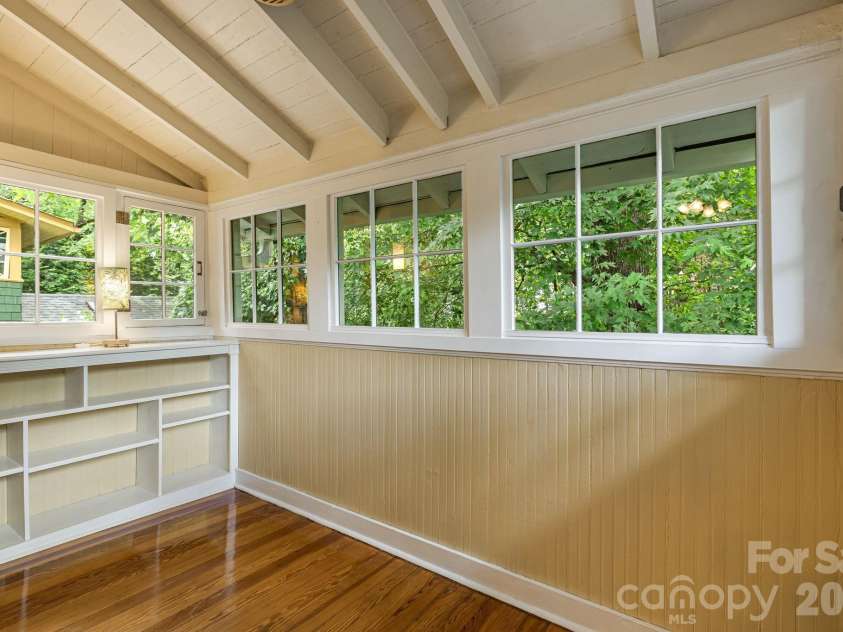 28 Woodlawn Avenue, Asheville, NC 28801.  MLS# CAR4405546, YatesRealty ID 40468. Tree-house Feel