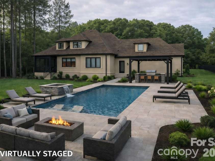 108 Washam Road, Mooresville, NC 28117.  MLS# CAR4334255, YatesRealty ID 4048. Virtually staged image showing potential outdoor living and pool design.