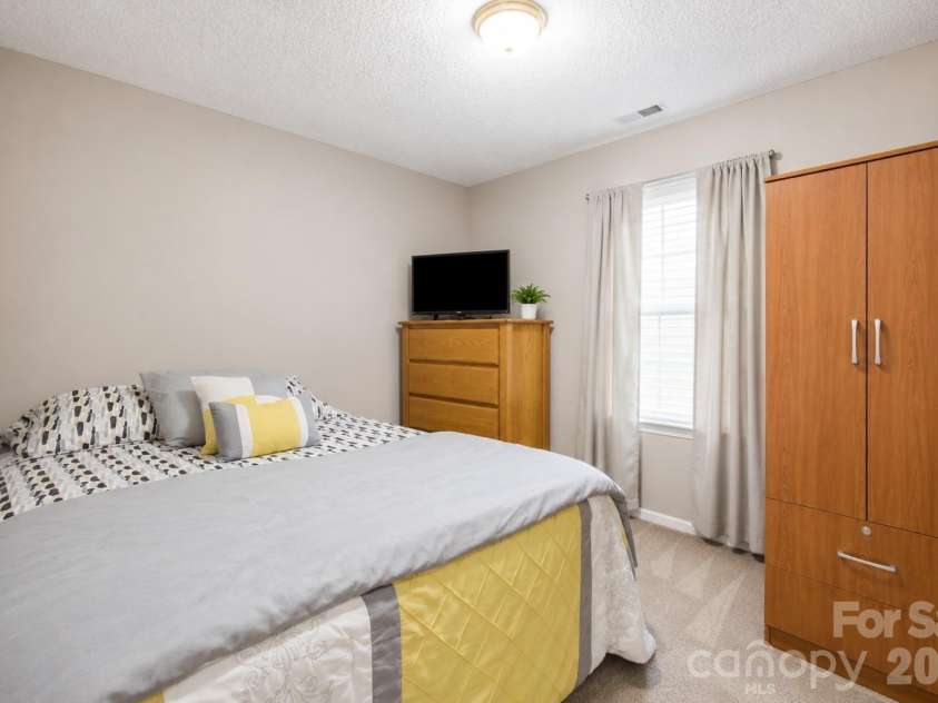 302 Elm Street, Wingate, NC 28174.  MLS# CAR4404536, YatesRealty ID 40487. Bedroom 2