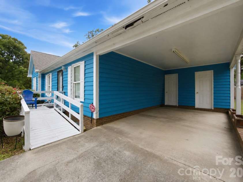 302 Elm Street, Wingate, NC 28174.  MLS# CAR4404536, YatesRealty ID 40487. Carport