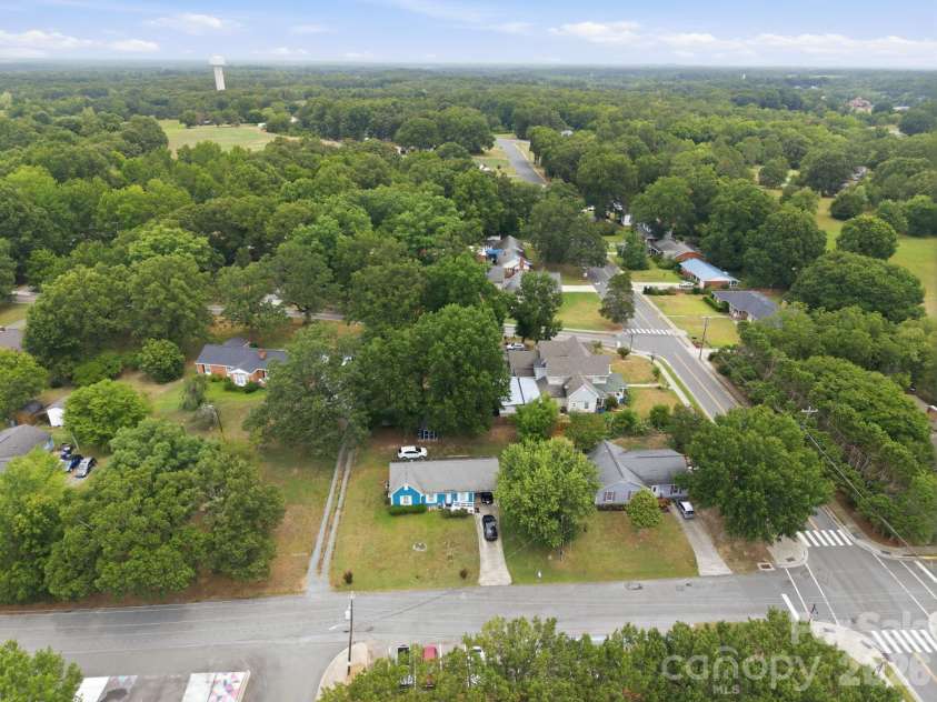 302 Elm Street, Wingate, NC 28174.  MLS# CAR4404536, YatesRealty ID 40487. Drone- front view