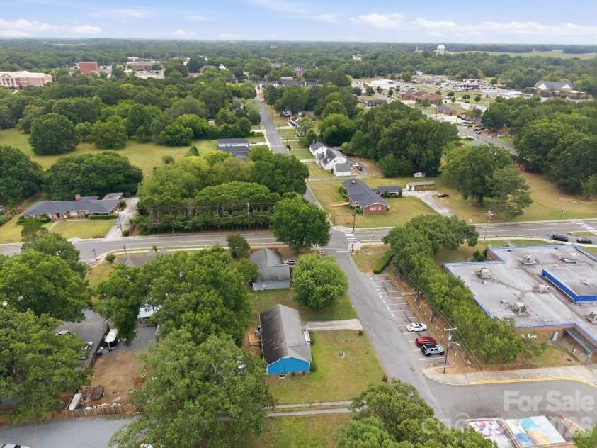 302 Elm Street, Wingate, NC 28174.  MLS# CAR4404536, YatesRealty ID 40487. Drone-side view