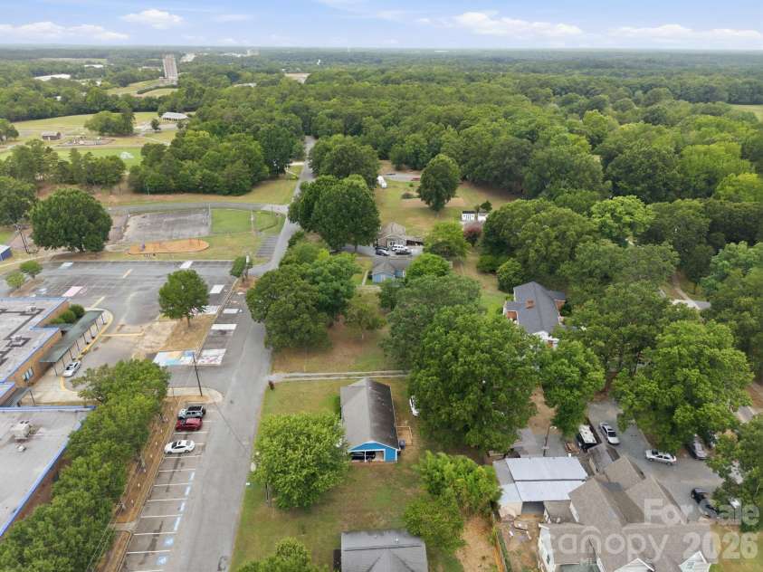 302 Elm Street, Wingate, NC 28174.  MLS# CAR4404536, YatesRealty ID 40487. Drone side view