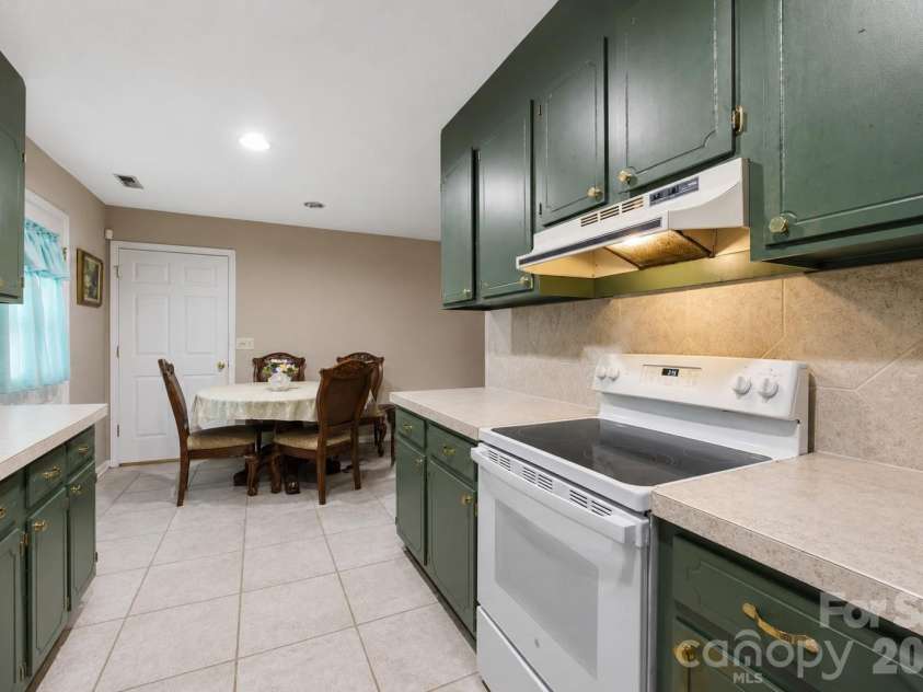 302 Elm Street, Wingate, NC 28174.  MLS# CAR4404536, YatesRealty ID 40487. Kitchen