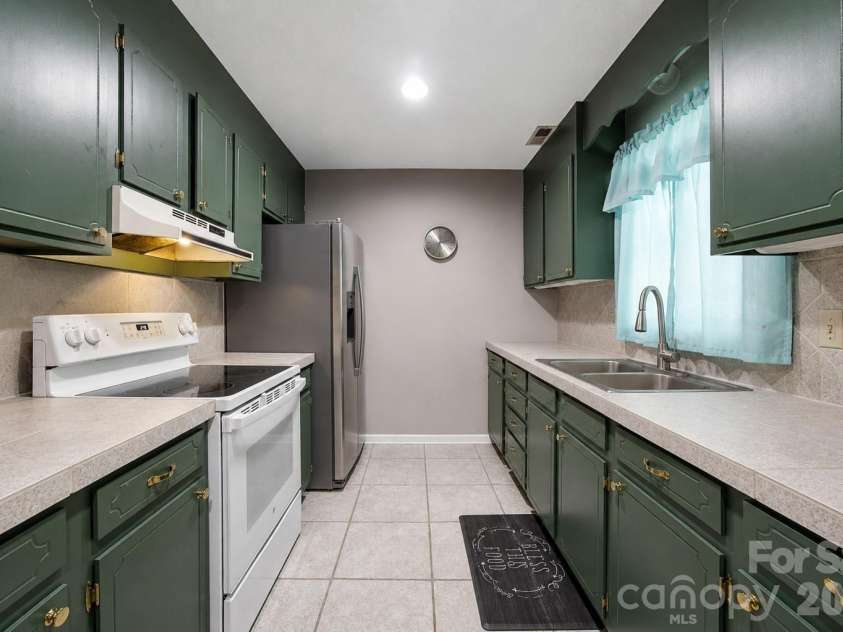 302 Elm Street, Wingate, NC 28174.  MLS# CAR4404536, YatesRealty ID 40487. Kitchen