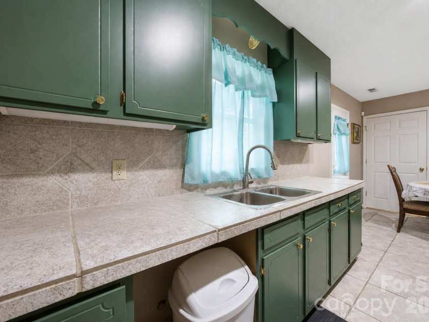 302 Elm Street, Wingate, NC 28174.  MLS# CAR4404536, YatesRealty ID 40487. Kitchen