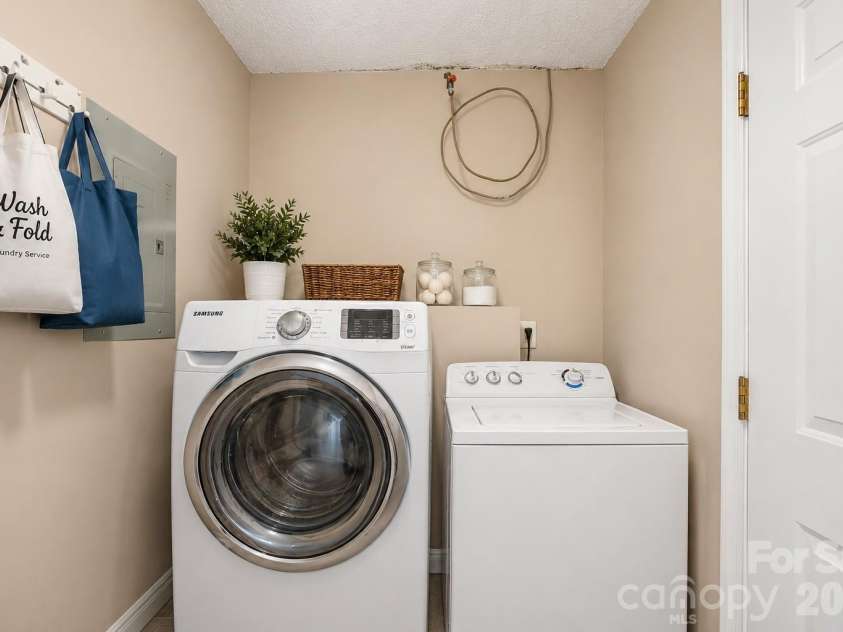 302 Elm Street, Wingate, NC 28174.  MLS# CAR4404536, YatesRealty ID 40487. Laundry room