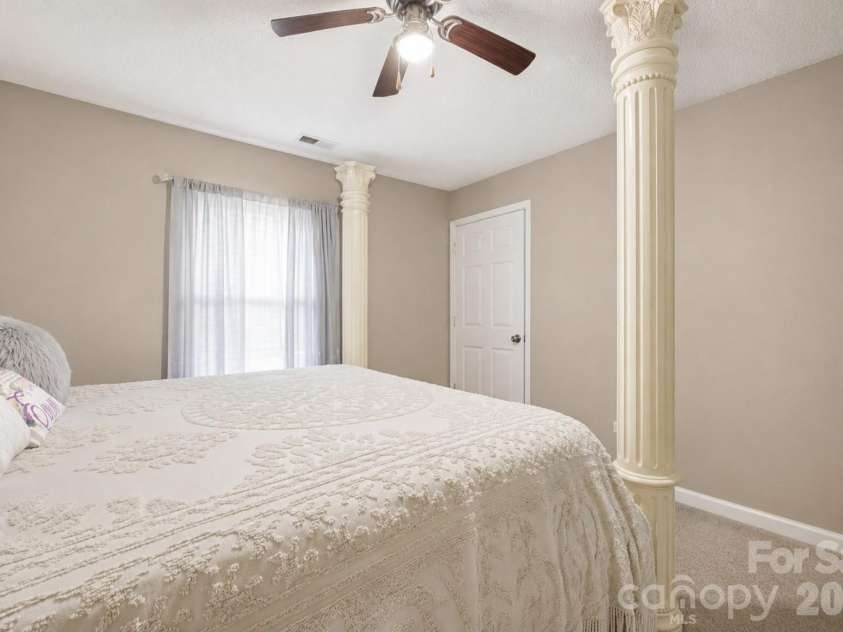 302 Elm Street, Wingate, NC 28174.  MLS# CAR4404536, YatesRealty ID 40487. Primary bedroom