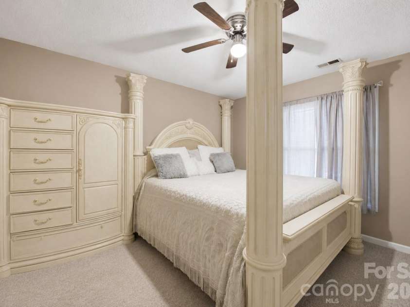 302 Elm Street, Wingate, NC 28174.  MLS# CAR4404536, YatesRealty ID 40487. Primary bedroom