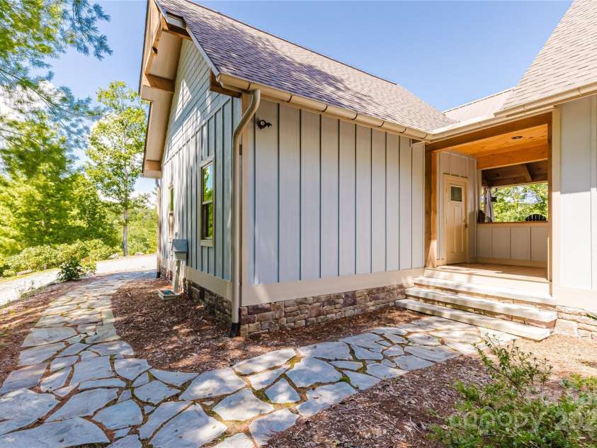 216 Alarka Point, Bryson City, NC 28713.  MLS# CAR4292798, YatesRealty ID 4049. Breezeway from Garage to House