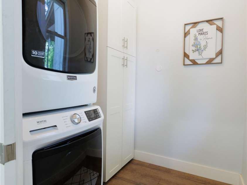 216 Alarka Point, Bryson City, NC 28713.  MLS# CAR4292798, YatesRealty ID 4049. Laundry Behind Kitchen