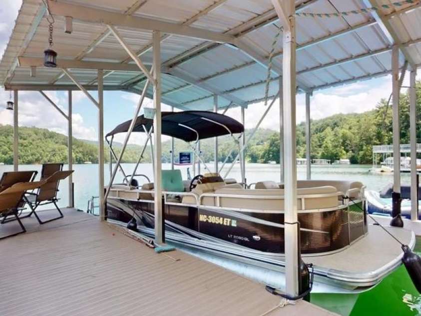 216 Alarka Point, Bryson City, NC 28713.  MLS# CAR4292798, YatesRealty ID 4049. Plenty of room for your toys