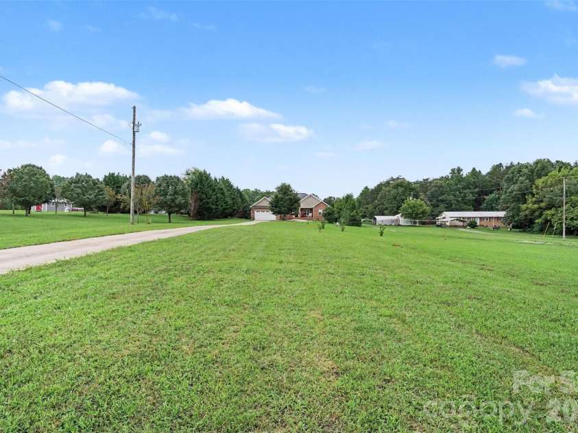 4574 Hunter Rhyne Road, Lincolnton, NC 28092.  MLS# CAR4398047, YatesRealty ID 40491. Front view from street