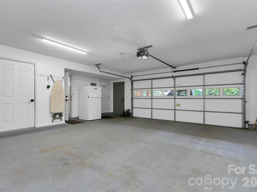 2 Duya Court, Brevard, NC 28712.  MLS# CAR4404747, YatesRealty ID 40518. 2 car garage with additional refrigerator