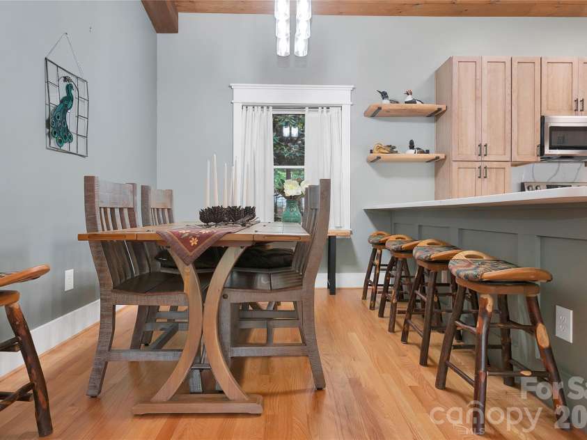 2 Duya Court, Brevard, NC 28712.  MLS# CAR4404747, YatesRealty ID 40518. Dining Space keeps the open concept to the kitchen and the Great Room