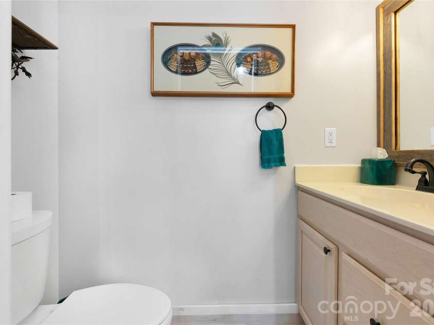2 Duya Court, Brevard, NC 28712.  MLS# CAR4404747, YatesRealty ID 40518. Half Bathroom off Entry Hallway
