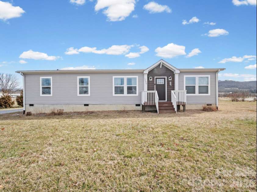 1796 Pilot Mountain Road, Hendersonville, NC 28792.  MLS# CAR4336944, YatesRealty ID 4052. 