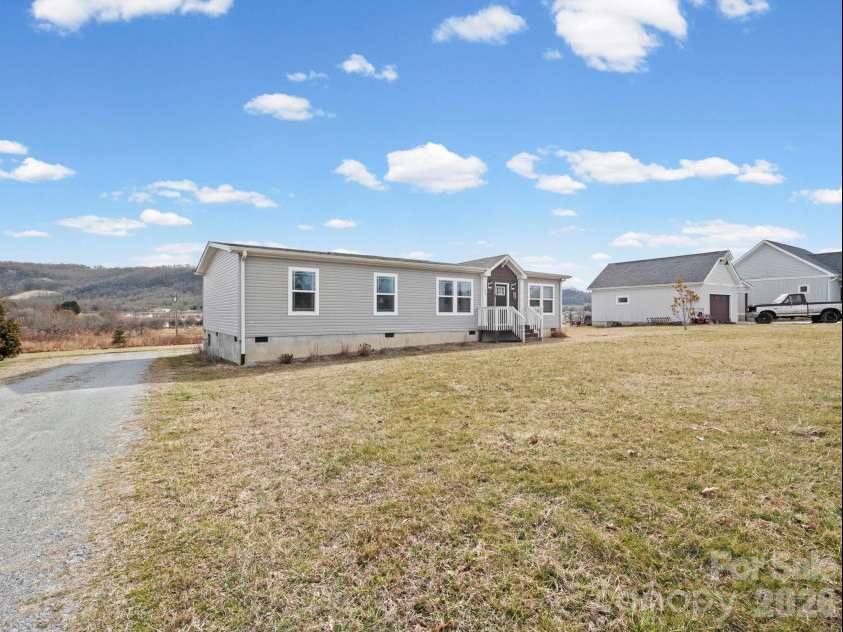 1796 Pilot Mountain Road, Hendersonville, NC 28792.  MLS# CAR4336944, YatesRealty ID 4052. 