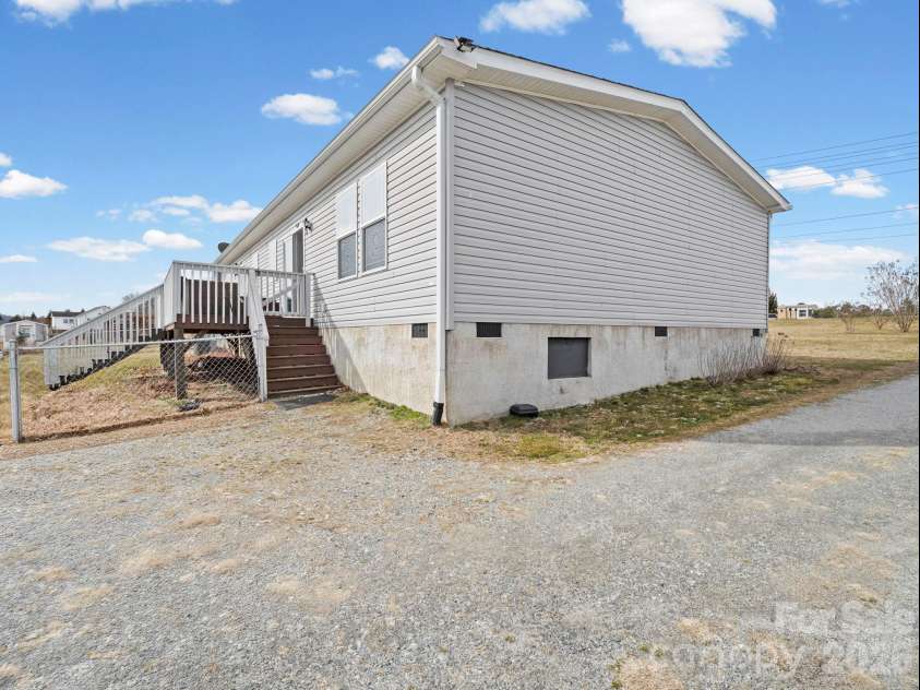 1796 Pilot Mountain Road, Hendersonville, NC 28792.  MLS# CAR4336944, YatesRealty ID 4052. 