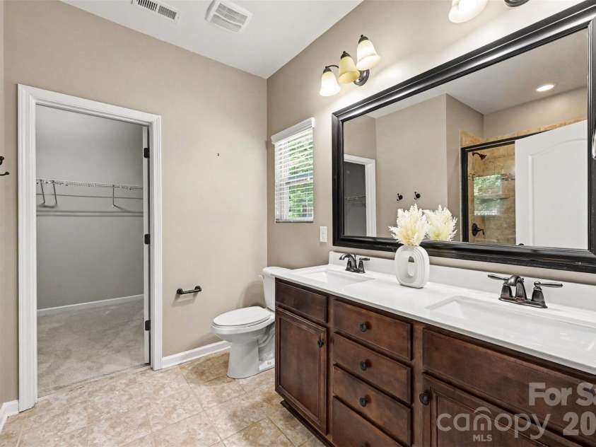 1604 Spring Blossom Trail, Fort Mill, SC 29708.  MLS# CAR4407322, YatesRealty ID 40533. Primary Bathroom