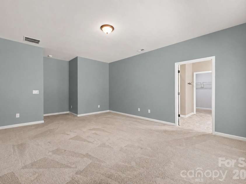 1604 Spring Blossom Trail, Fort Mill, SC 29708.  MLS# CAR4407322, YatesRealty ID 40533. Primary bedroom