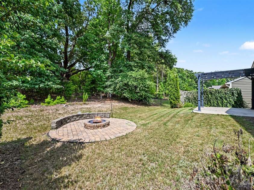 1604 Spring Blossom Trail, Fort Mill, SC 29708.  MLS# CAR4407322, YatesRealty ID 40533. Private back yard backing to HOA open space, no neighbor behind!