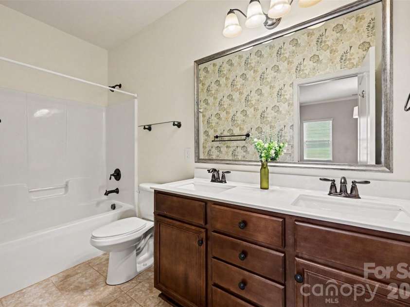 1604 Spring Blossom Trail, Fort Mill, SC 29708.  MLS# CAR4407322, YatesRealty ID 40533. Spare bathroom