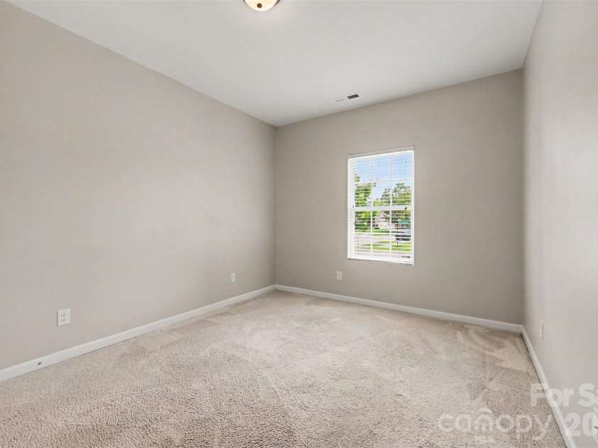 1604 Spring Blossom Trail, Fort Mill, SC 29708.  MLS# CAR4407322, YatesRealty ID 40533. Spare Bedroom 2