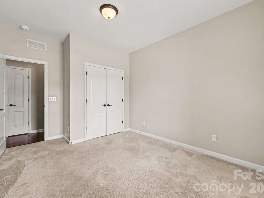 1604 Spring Blossom Trail, Fort Mill, SC 29708.  MLS# CAR4407322, YatesRealty ID 40533. Spare Bedroom 2