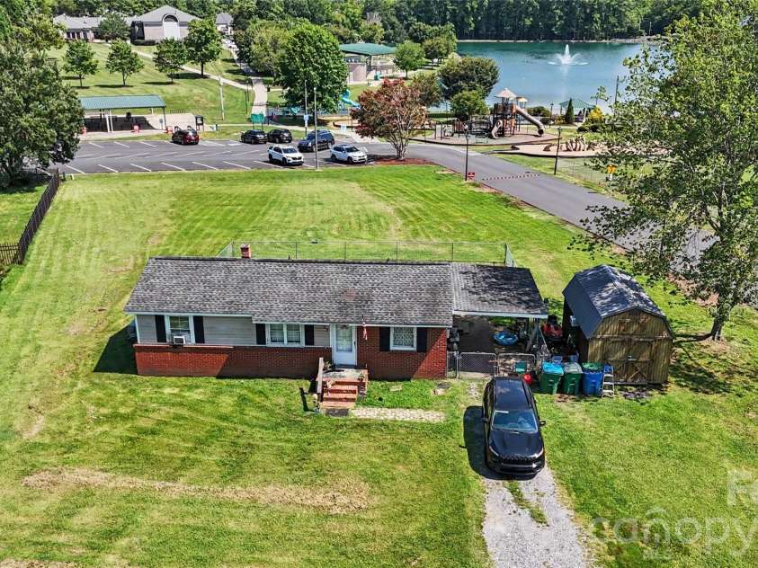 907 Lakeview Drive, Pineville, NC 28134.  MLS# CAR4407444, YatesRealty ID 40536. 