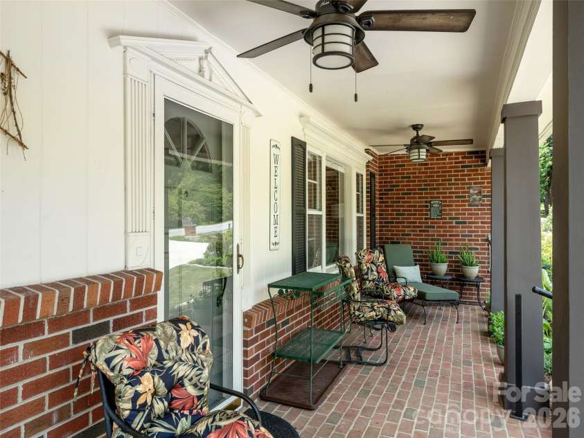 525 Carson Drive, Hendersonville, NC 28791.  MLS# CAR4409464, YatesRealty ID 40537. Covered Front Porch