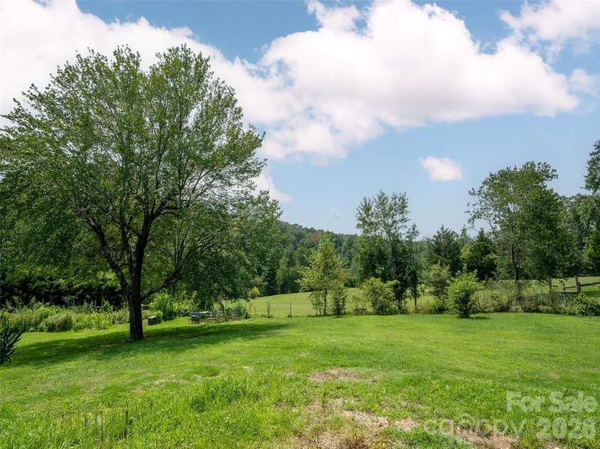 525 Carson Drive, Hendersonville, NC 28791.  MLS# CAR4409464, YatesRealty ID 40537. Level Backyard