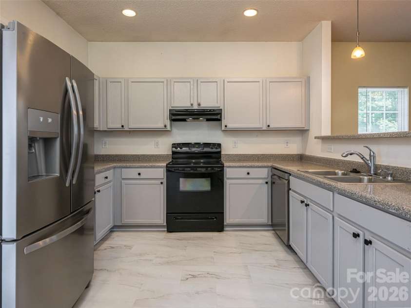 10 Ashe Road, Candler, NC 28715.  MLS# CAR4408371, YatesRealty ID 40538. Conveniently appointed kitchen