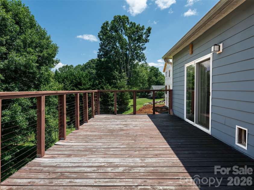 10 Ashe Road, Candler, NC 28715.  MLS# CAR4408371, YatesRealty ID 40538. Fun to entertain on large deck