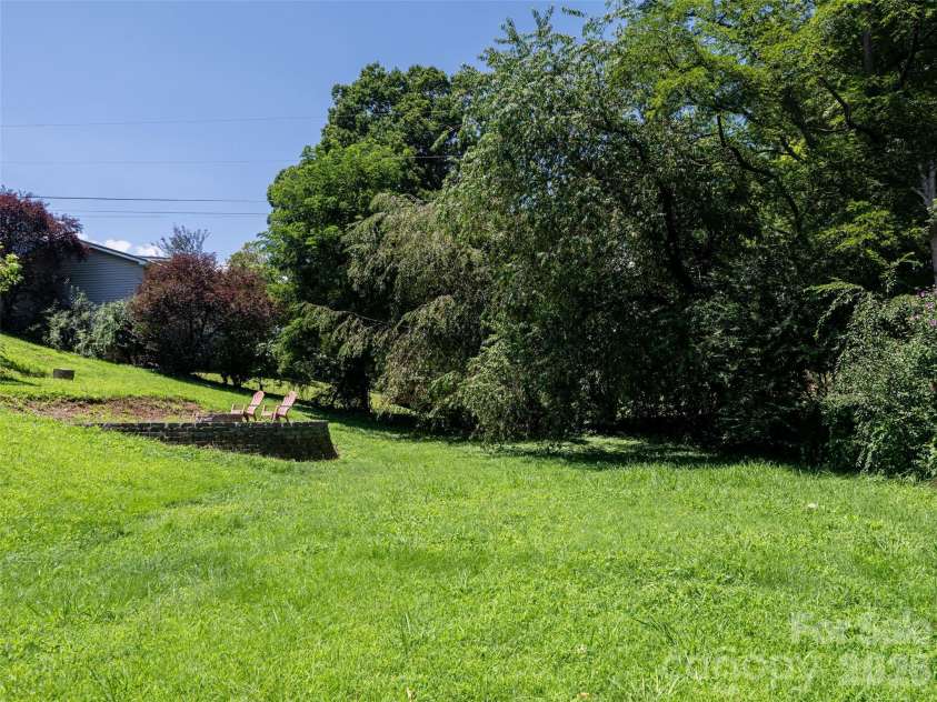 10 Ashe Road, Candler, NC 28715.  MLS# CAR4408371, YatesRealty ID 40538. Great garden spaces
