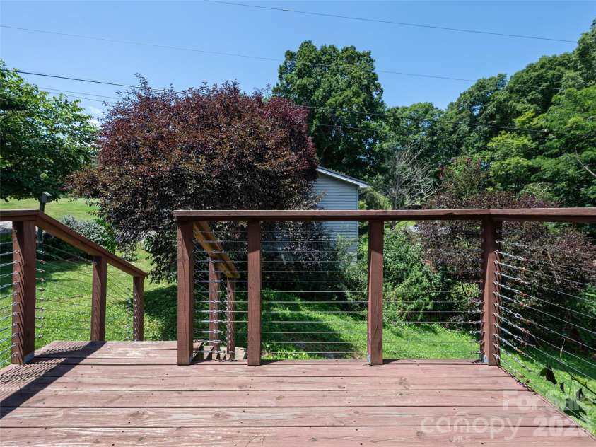 10 Ashe Road, Candler, NC 28715.  MLS# CAR4408371, YatesRealty ID 40538. Large deck