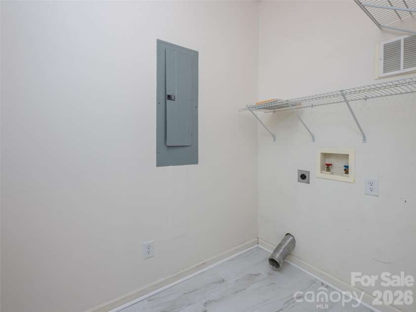 10 Ashe Road, Candler, NC 28715.  MLS# CAR4408371, YatesRealty ID 40538. Main level laundry