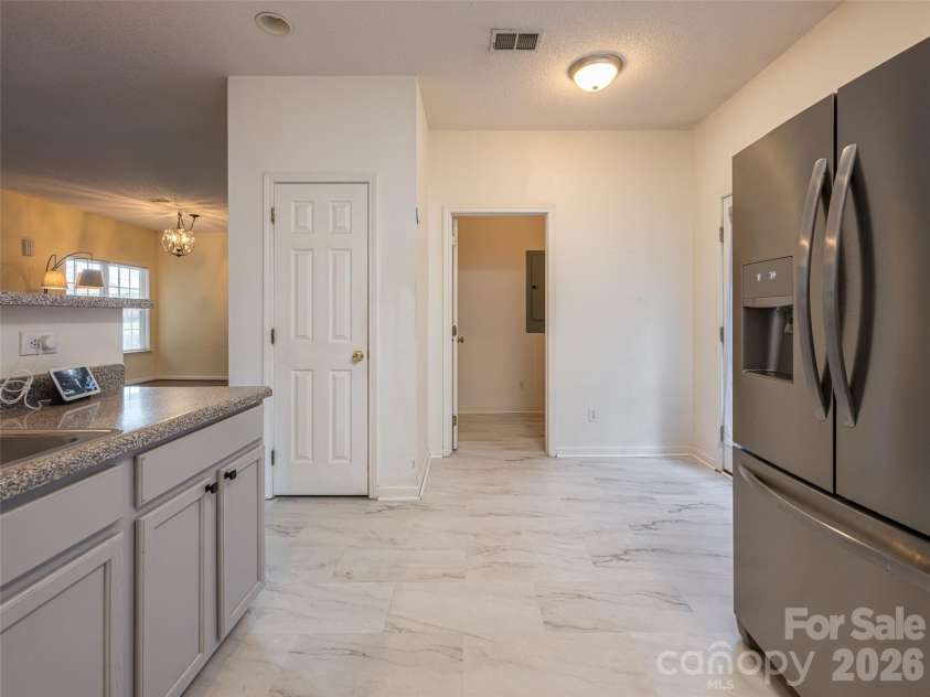 10 Ashe Road, Candler, NC 28715.  MLS# CAR4408371, YatesRealty ID 40538. Pantry and Laundry area