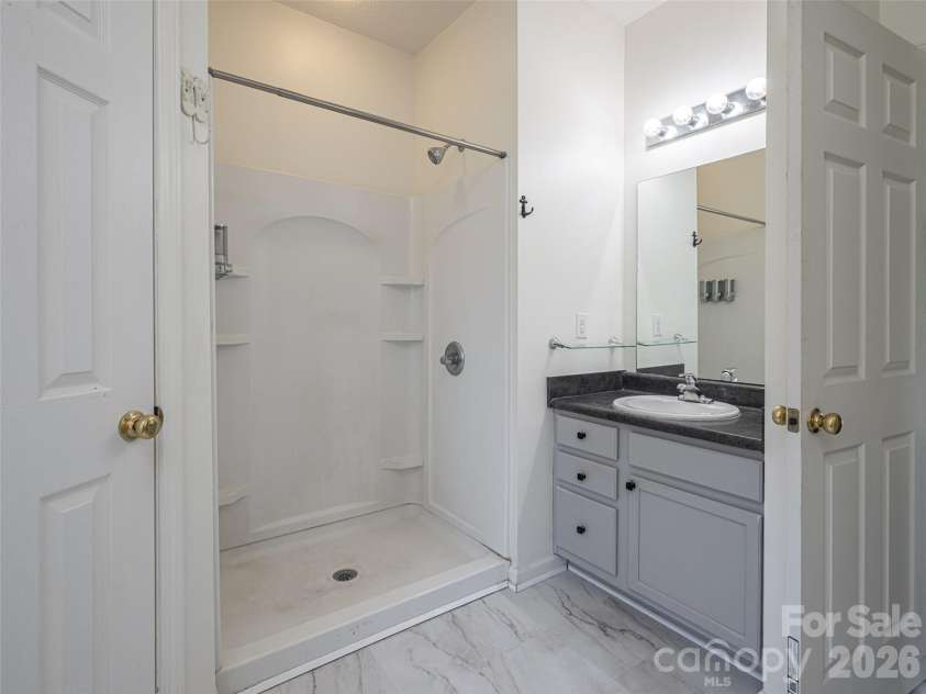 10 Ashe Road, Candler, NC 28715.  MLS# CAR4408371, YatesRealty ID 40538. Walk in shower