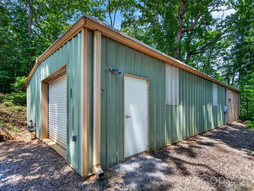 760 Glenn Bridge Road, Arden, NC 28704.  MLS# CAR4408789, YatesRealty ID 40540. Workshop with Bathroom