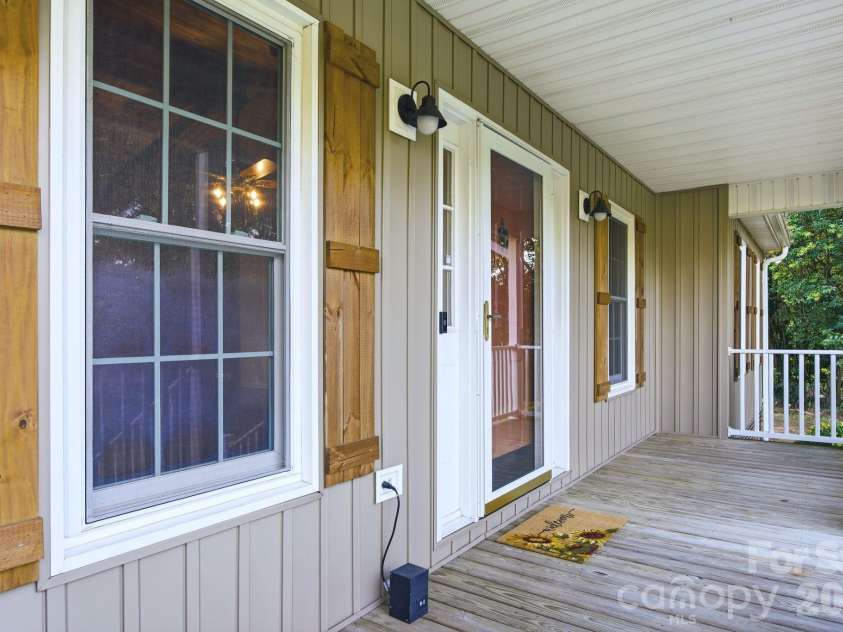 1905 Stokes Ferry Road, Salisbury, NC 28146.  MLS# CAR4404046, YatesRealty ID 40548. Rocking chair Front porch