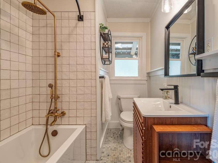 78 Morris Street, Asheville, NC 28806.  MLS# CAR4402363, YatesRealty ID 40549. Beautifully remodeled tile bathroom
