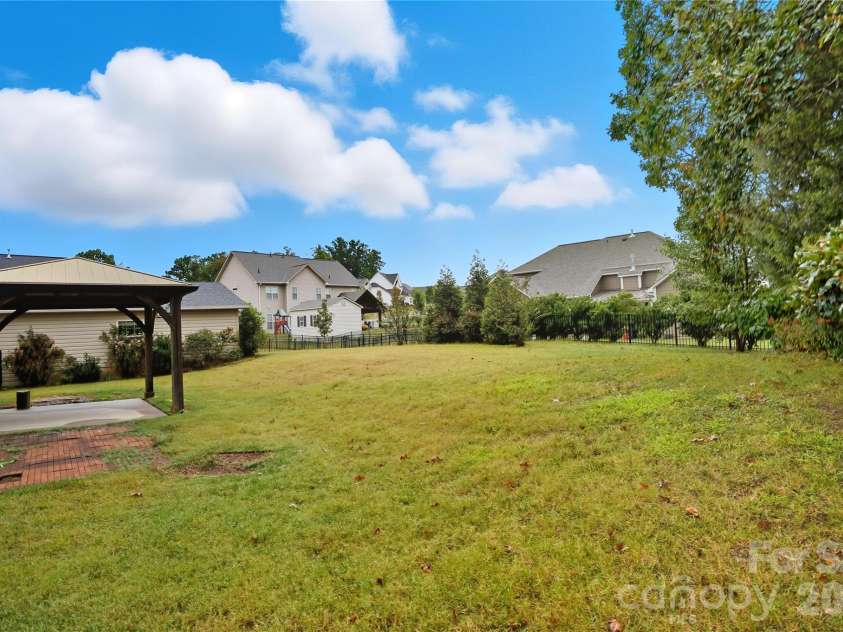 2365 Baxter Place, Concord, NC 28025.  MLS# CAR4307880, YatesRealty ID 4055. Backyard
