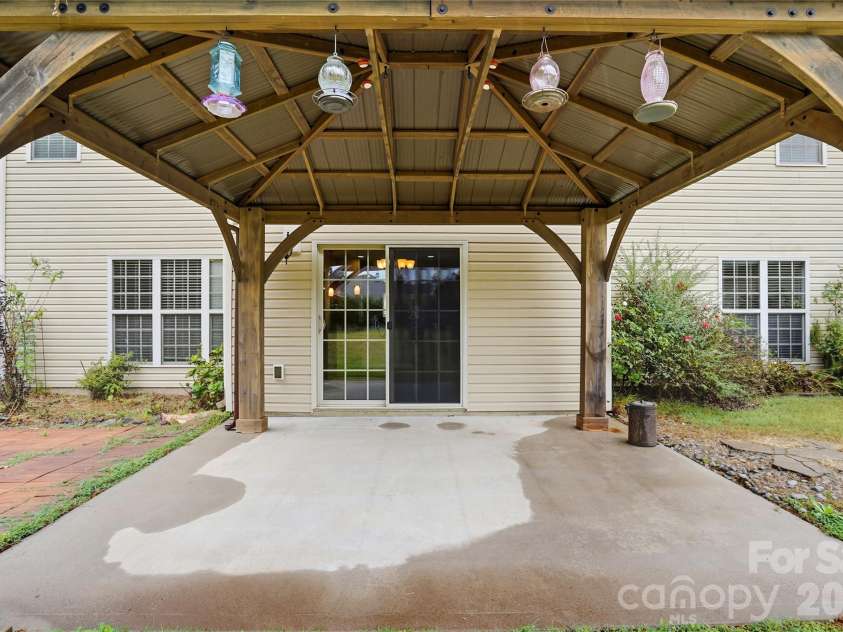 2365 Baxter Place, Concord, NC 28025.  MLS# CAR4307880, YatesRealty ID 4055. Covered Rear Patio