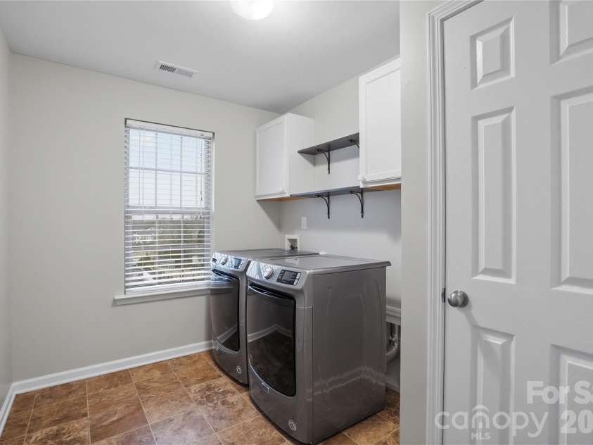 2365 Baxter Place, Concord, NC 28025.  MLS# CAR4307880, YatesRealty ID 4055. Laundry Room