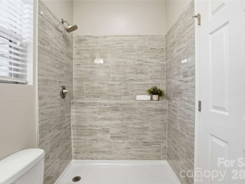 2365 Baxter Place, Concord, NC 28025.  MLS# CAR4307880, YatesRealty ID 4055. Main level Full Bath